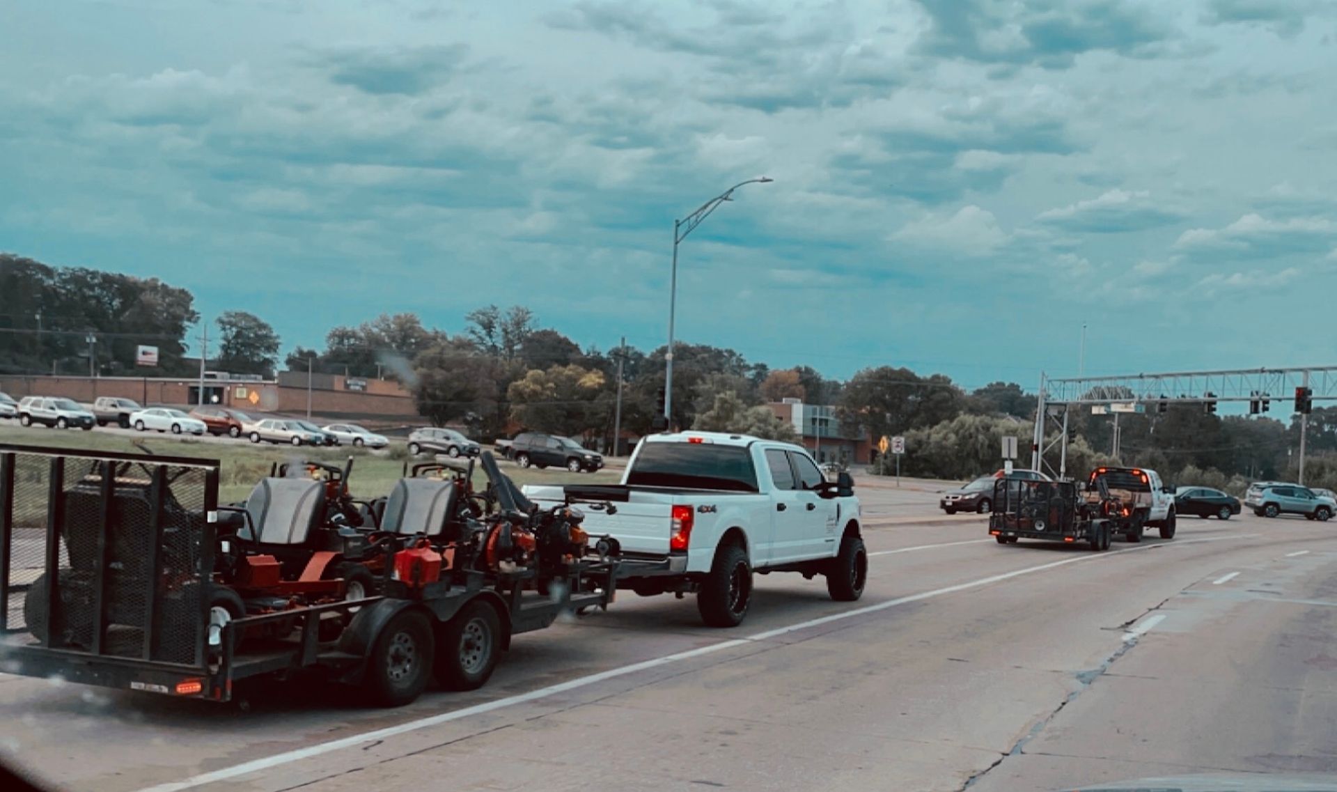 Lawn Mowers in the back of a truck