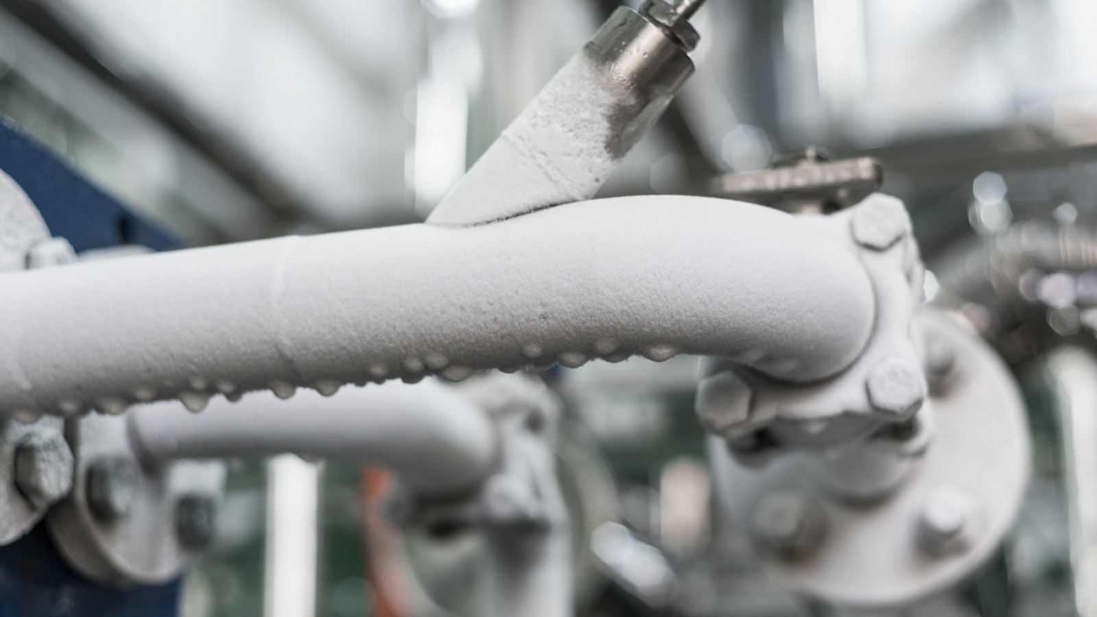 Pipe with water dripping from it.