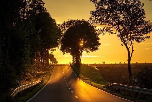 Peaceful roadway at sunset symbolizing compassionate funeral and cremation care in Lake Zurich IL