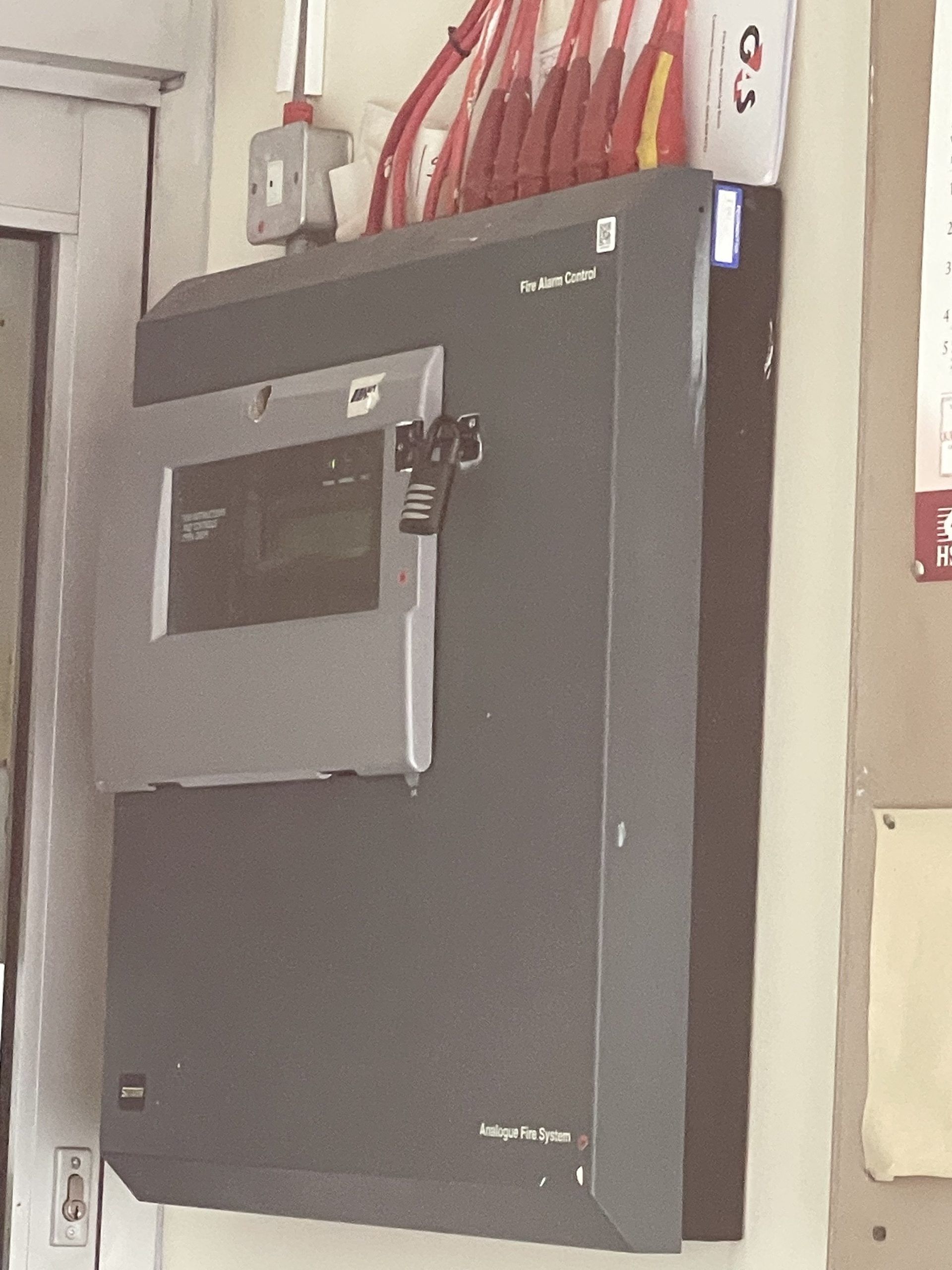 Analogue fire alarm control panel ready for a service check