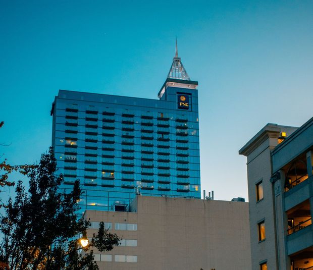 A tall building with a clock on top of it