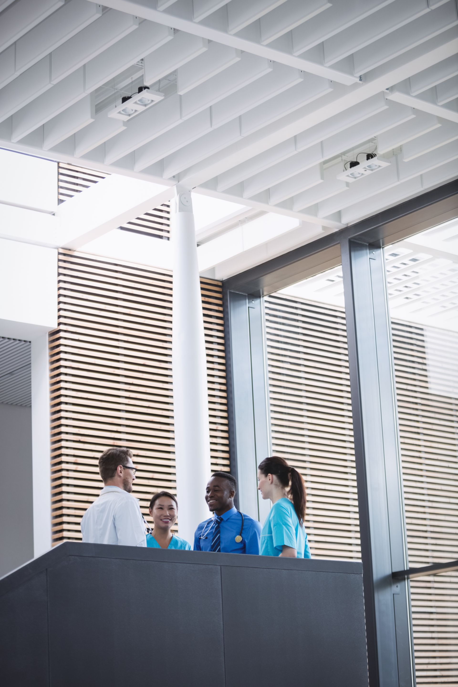Nurses and doctors interacting in a healthcare facility