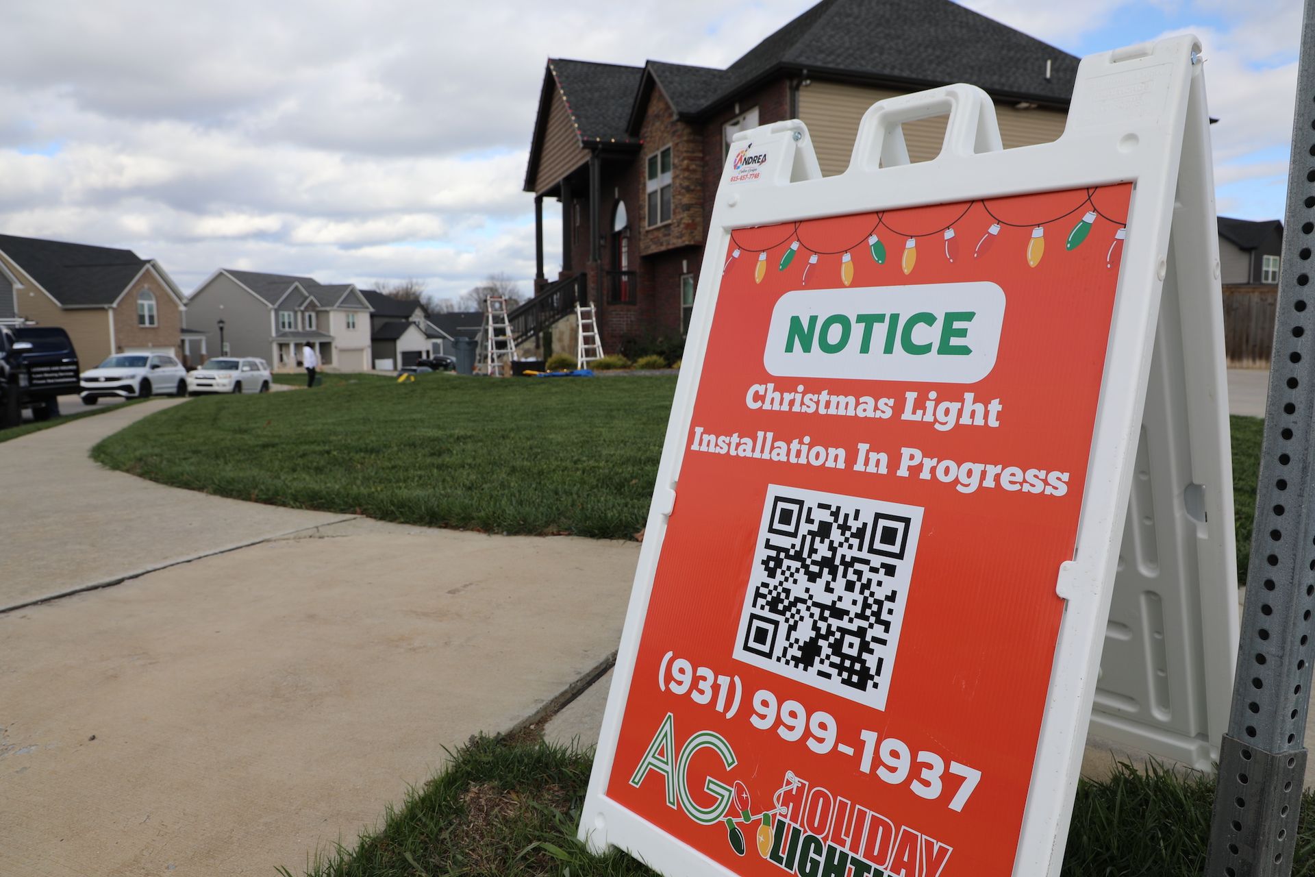 A sign that says notice christmas light installation in progress