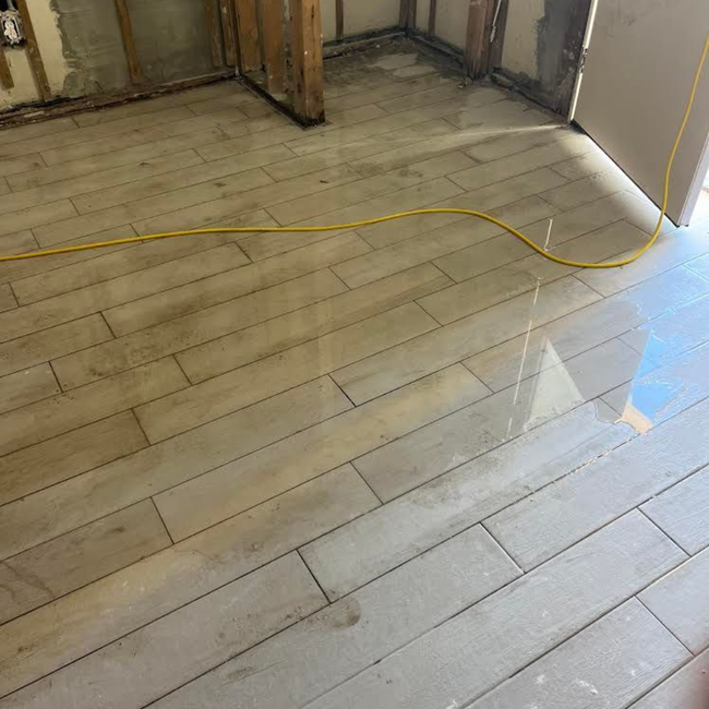 Flooded interior floor after hurricane damage in Lido Key, Sarasota Florida
