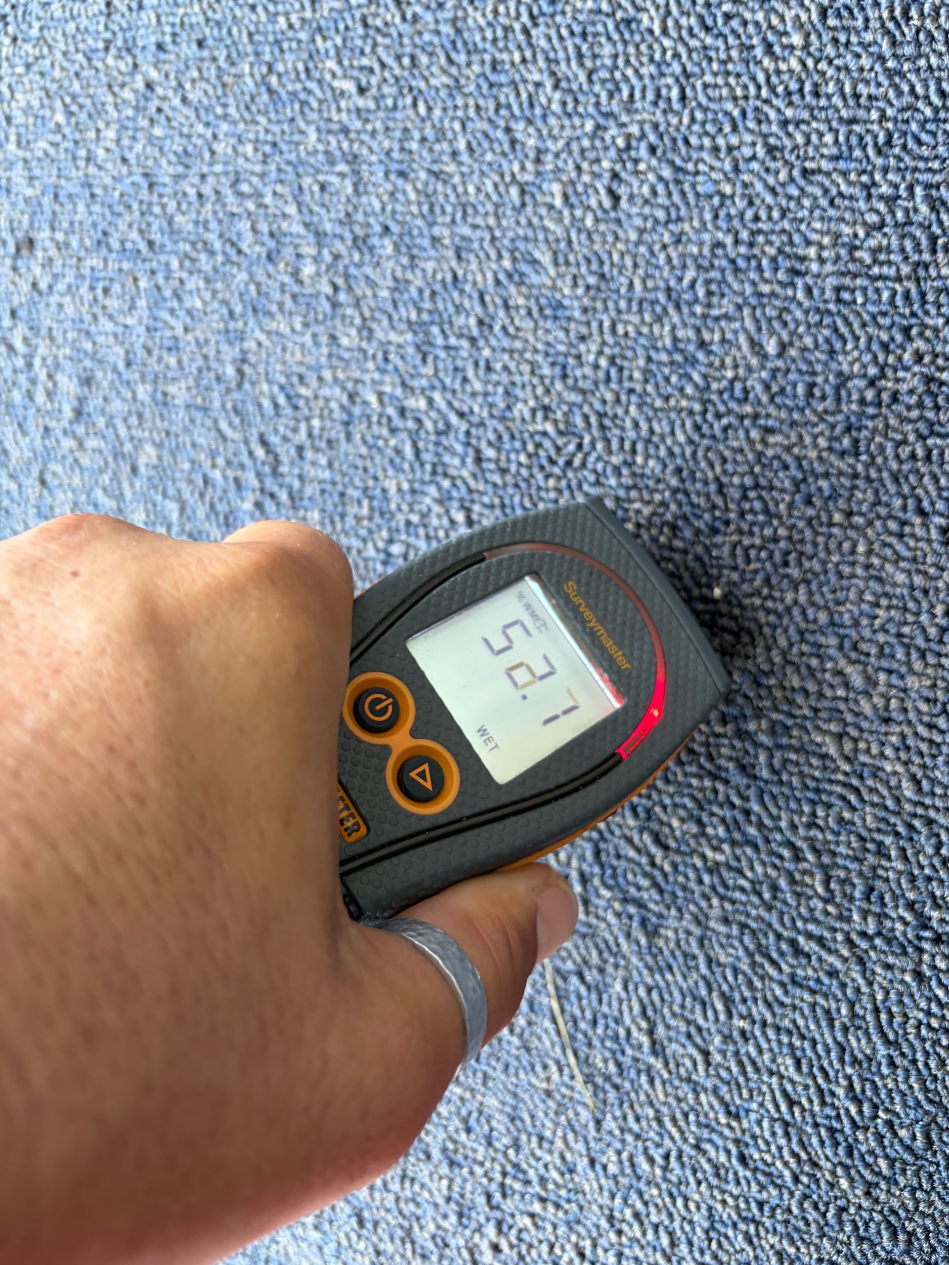 Acme technician checking for hidden moisture in a Florida home