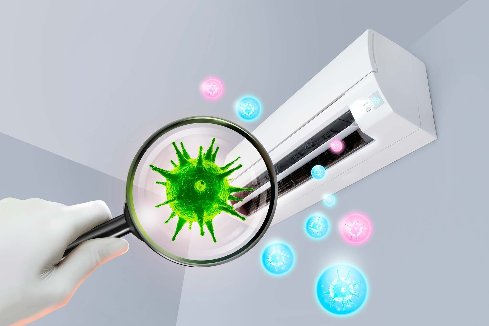 Hand holding magnifying glass over a virus near an air conditioner, depicting airborne contamination.