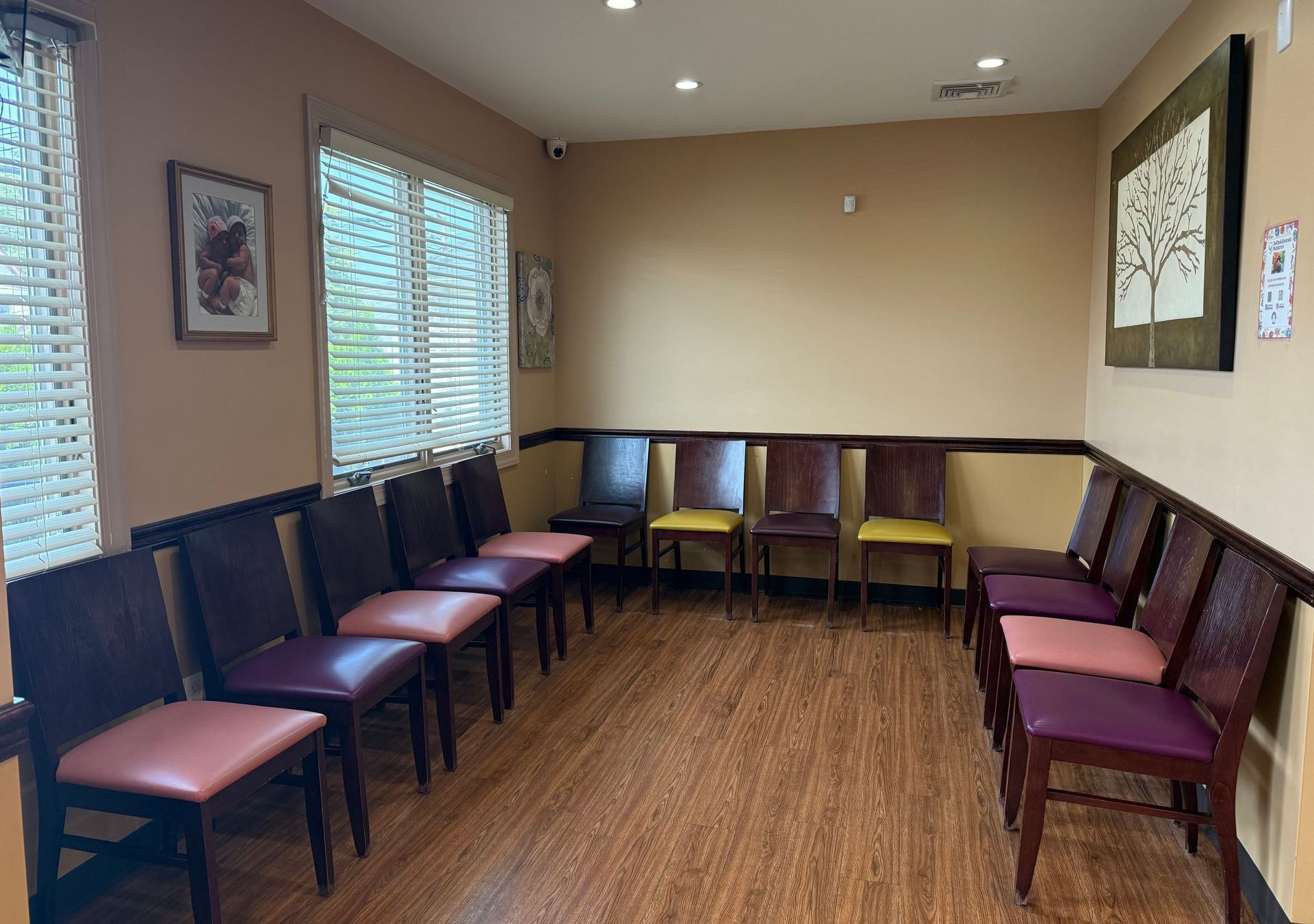DeVito & Alvarado Pediatrics' Staten Island, NY pediatric office with chairs and a warm environment.