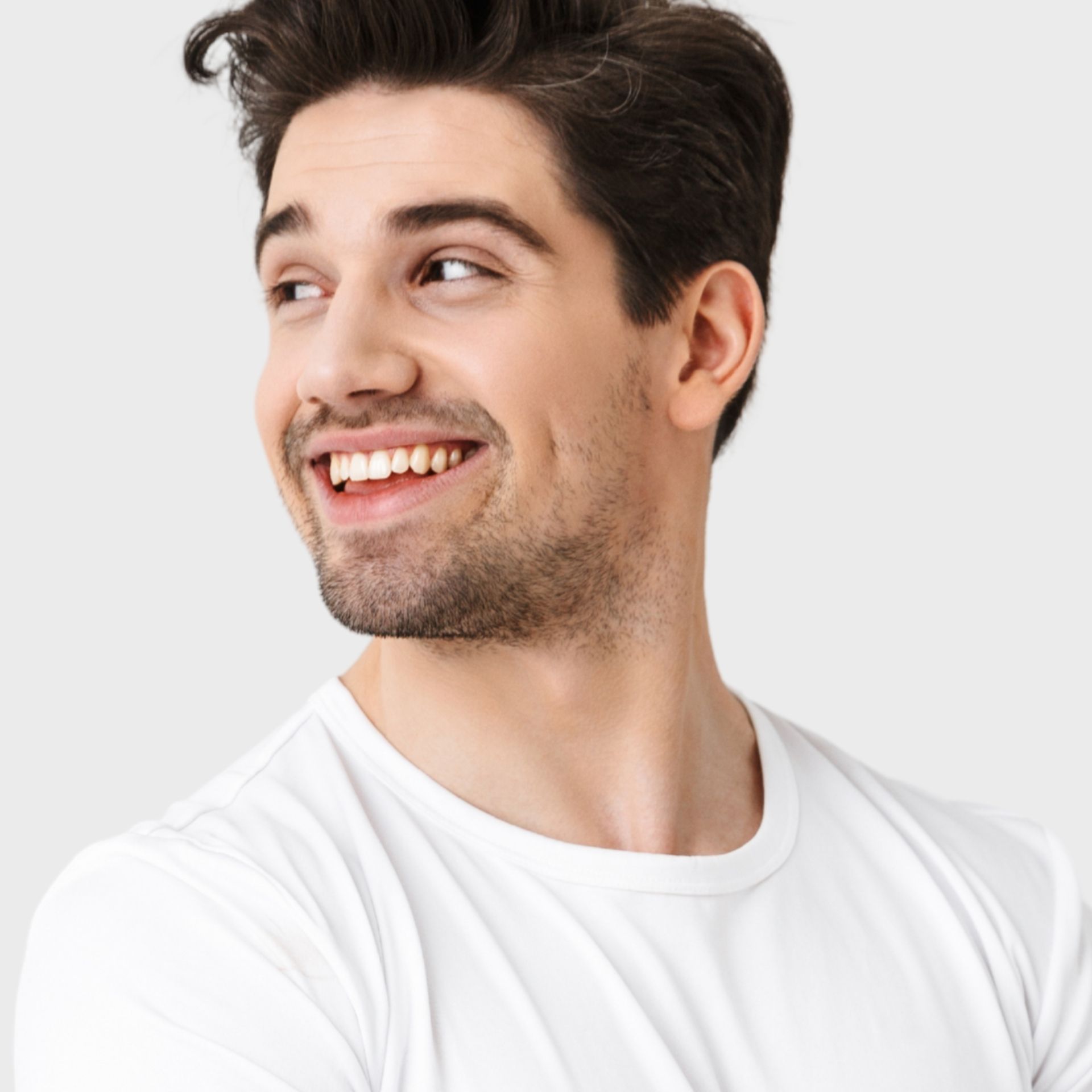 A woman wearing a blue and white striped shirt is smiling
