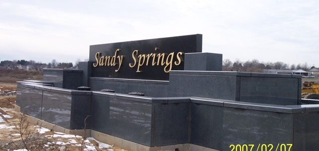 Stone sign reading