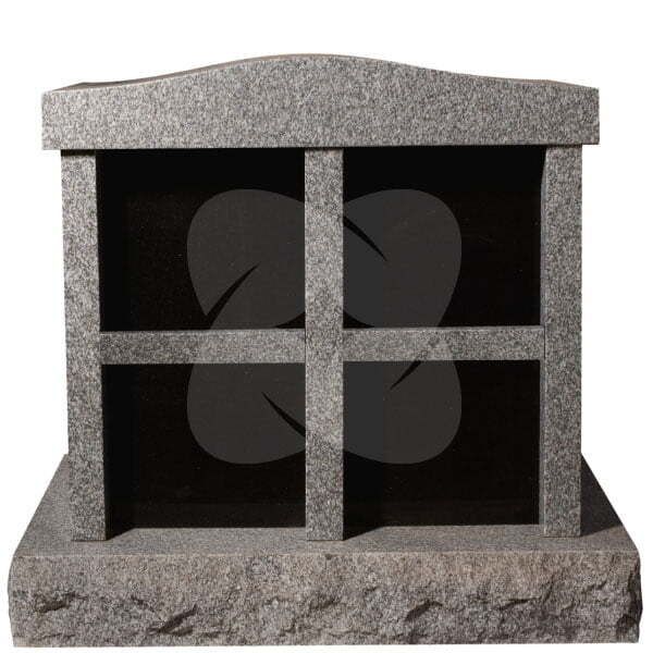 Gray granite columbarium with four compartments and a peaked top on a white background