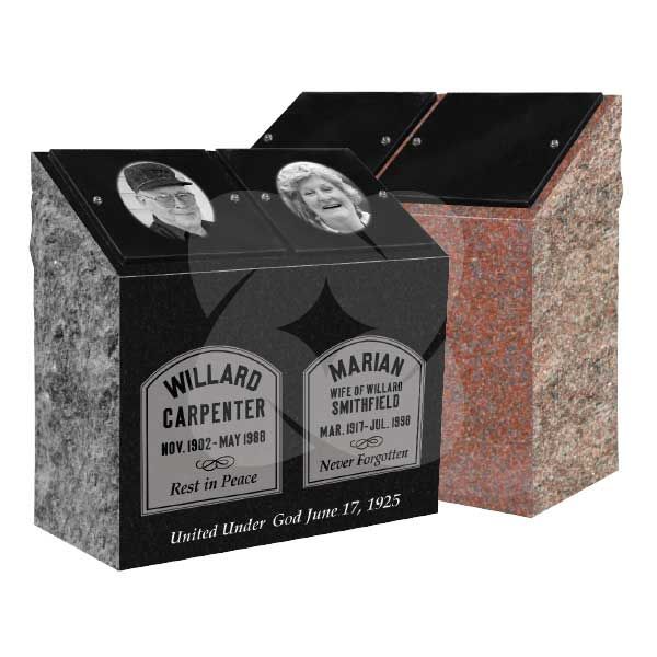 Black granite memorial headstone with oval portraits and engraved names, set on a speckled stone base