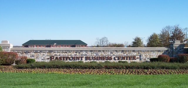 Easton Town Center sign in front of a landscaped shopping center building