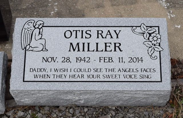 Gravestone for Otis Ray Miller with angel carvings and inscription; dates Nov. 28, 1942–Feb. 11, 2014.