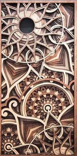 Intricate sepia-toned abstract gears and clockwork pattern with circular openings and radial spokes