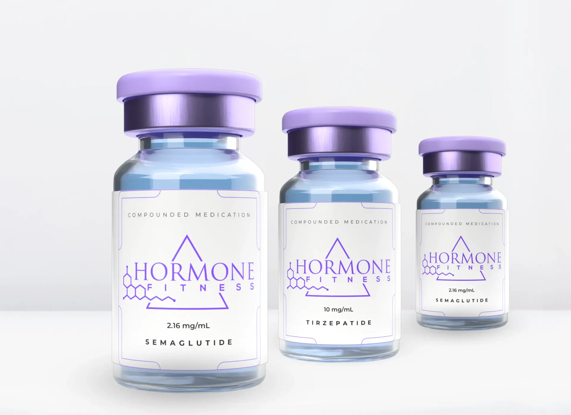 Three vials of GLP-1 medication are sitting next to each other on a table.