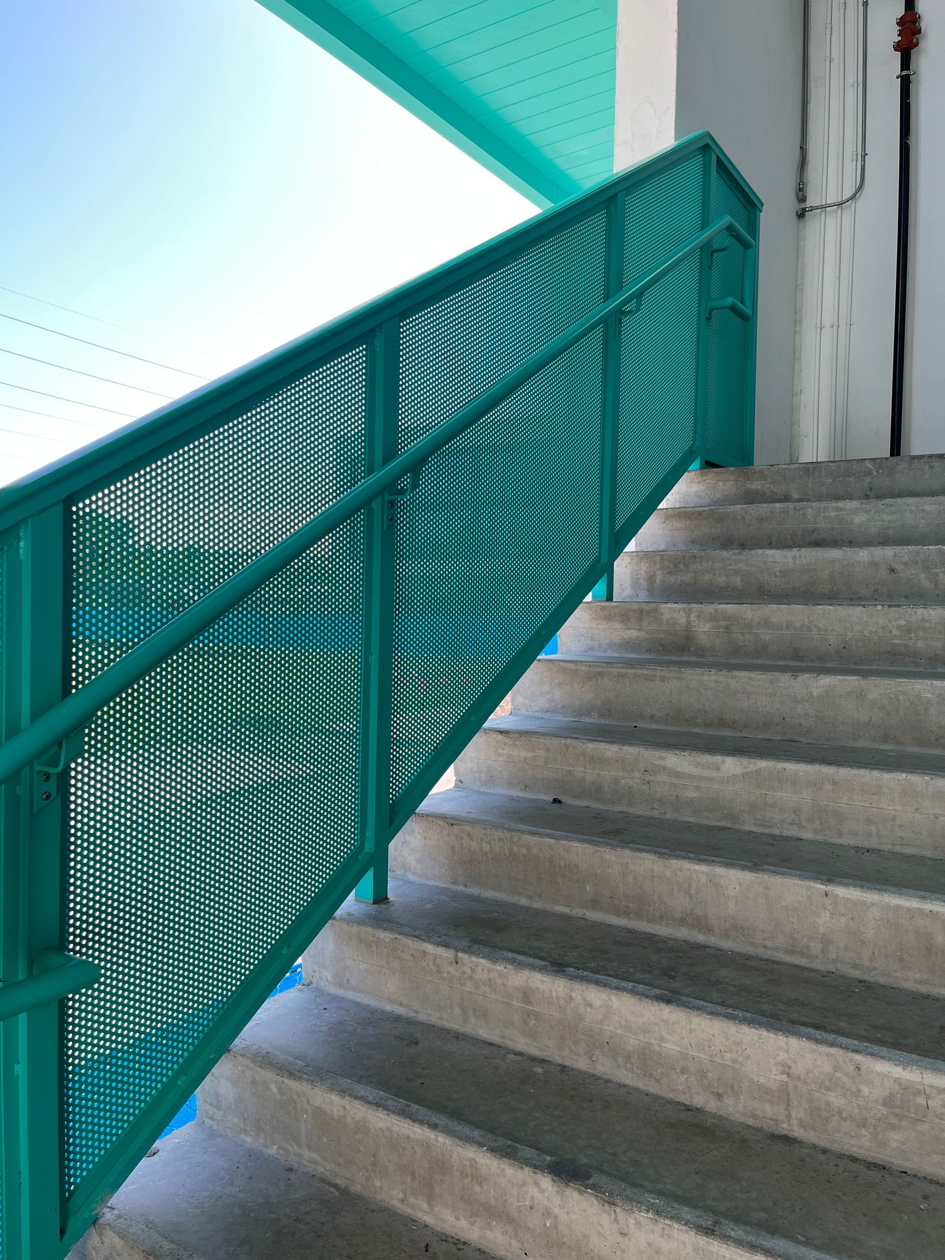 Painted stairs leading to a parking garage in Midtown