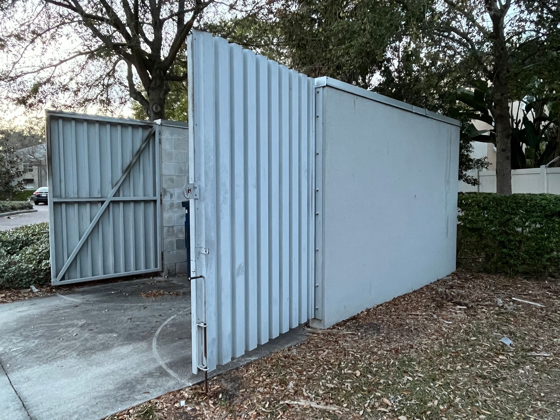 tampa dumpster gates at office building