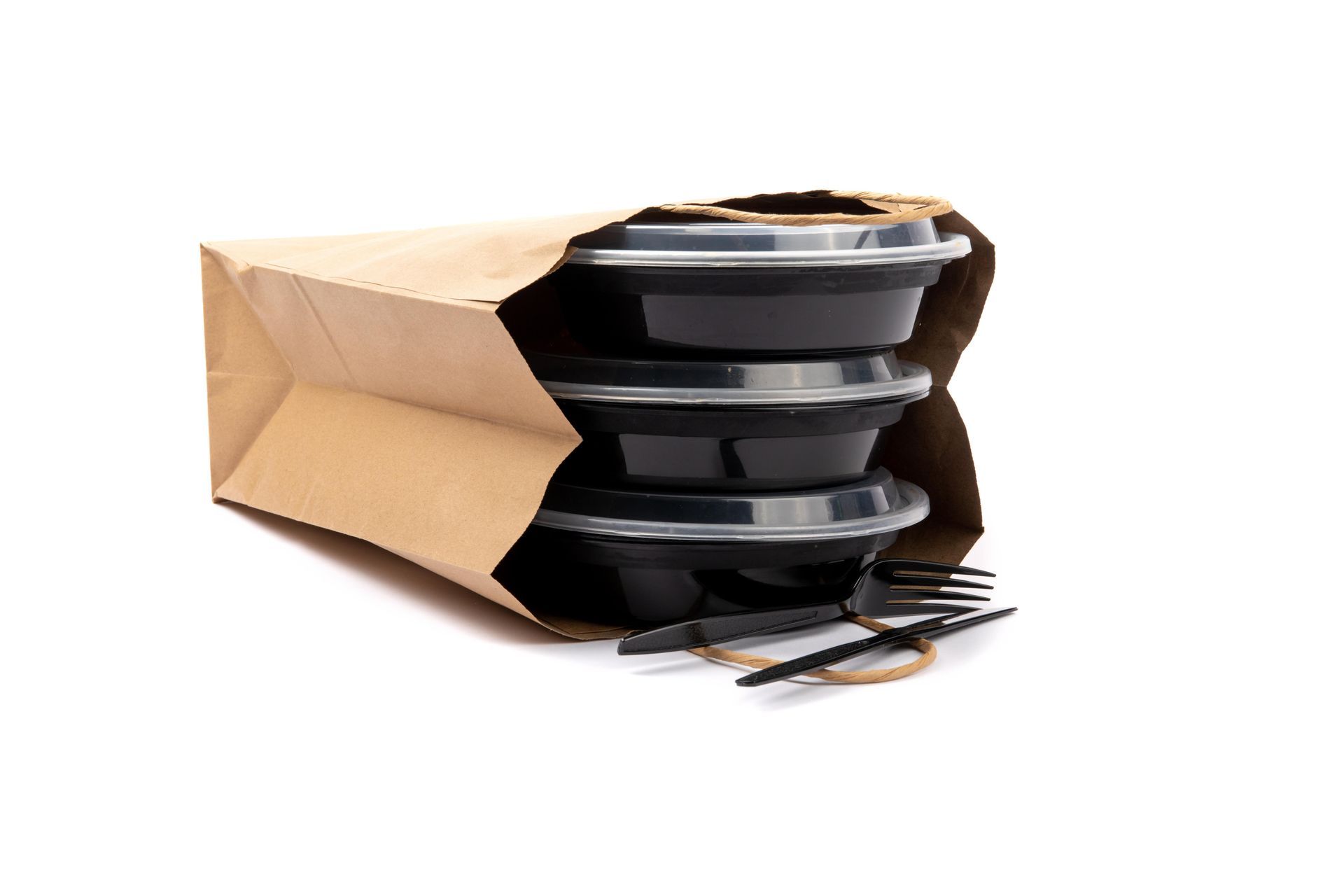 Brown paper bag holding three black food containers with clear lids, and black plastic utensils.
