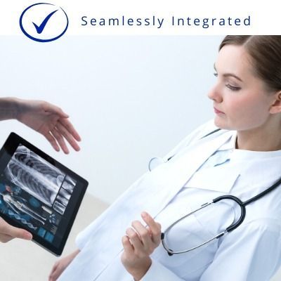 Doctor consulting with patient via tablet showing X-ray, with “Seamlessly Integrated” text.