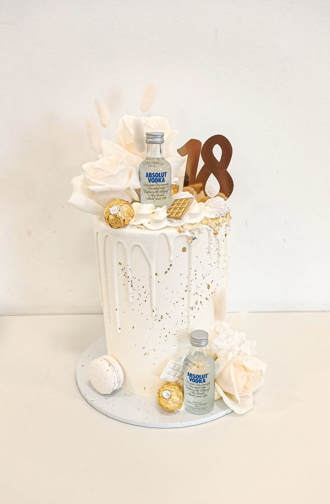 Elegant white 18th birthday drip cake Gold Coast