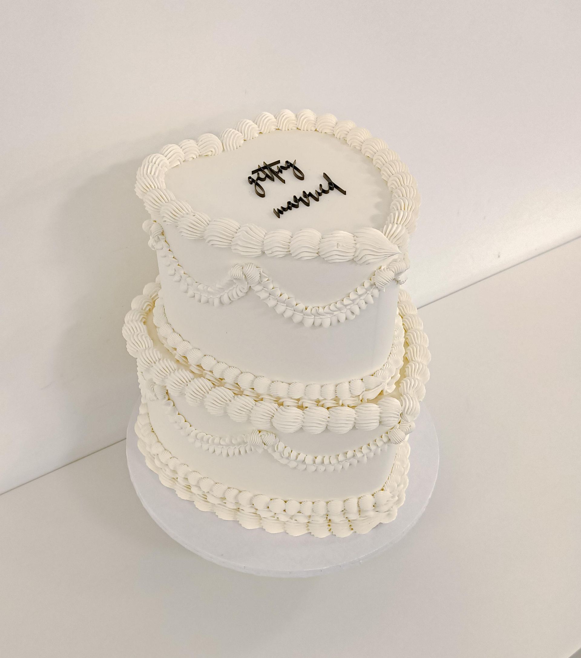 Tiered vintage heart shaped wedding cake with buttercream piping Gold Coast