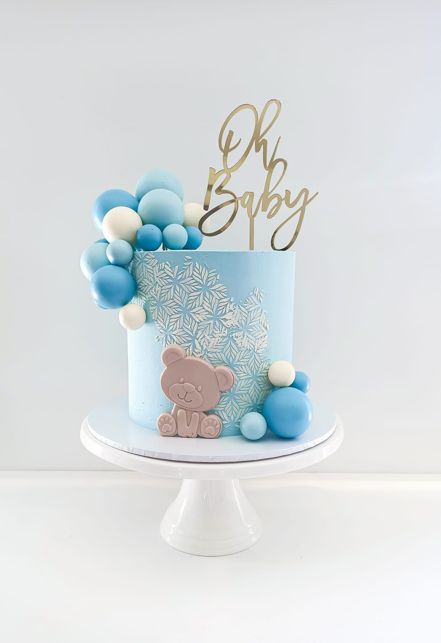 Blue baby shower cake with teddy bear Gold Coast