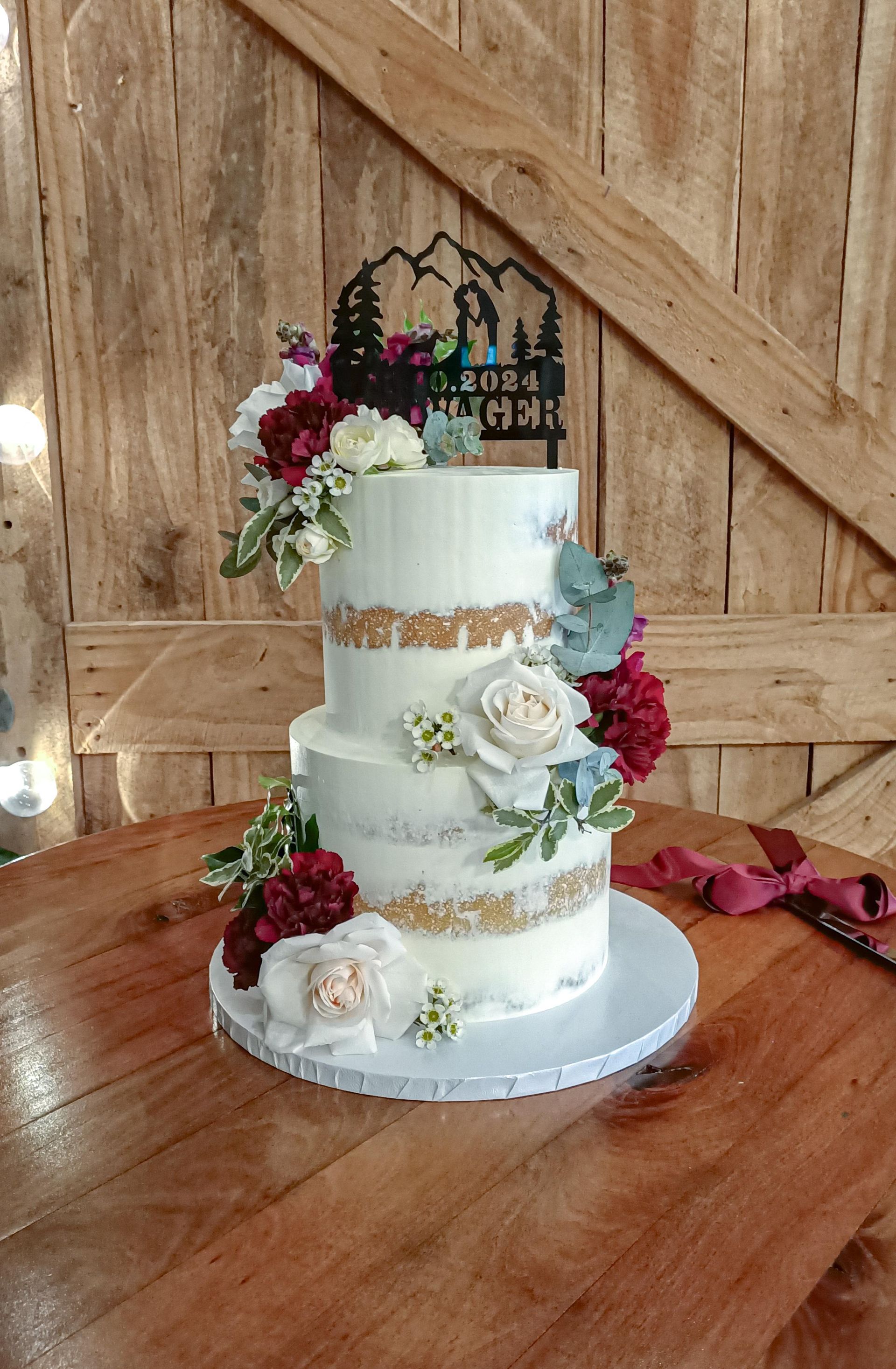 Semi naked wedding caek with fresh flowers Gold Coast