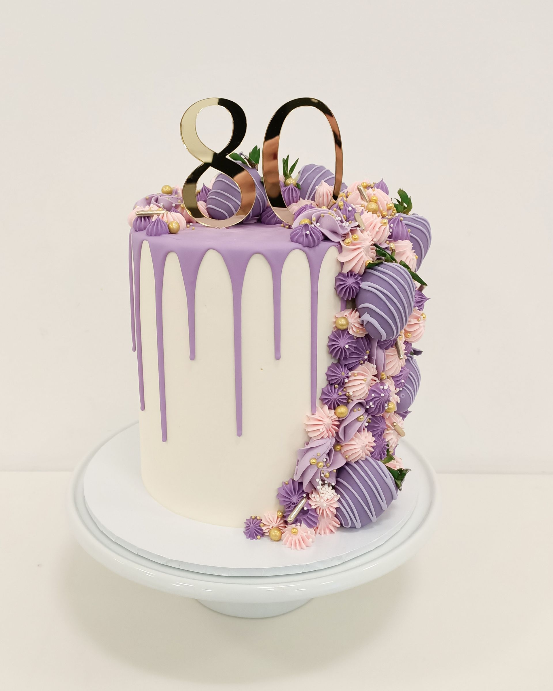 80th birthday purple drip cake with chocolate coated strawberries Gold Coast 