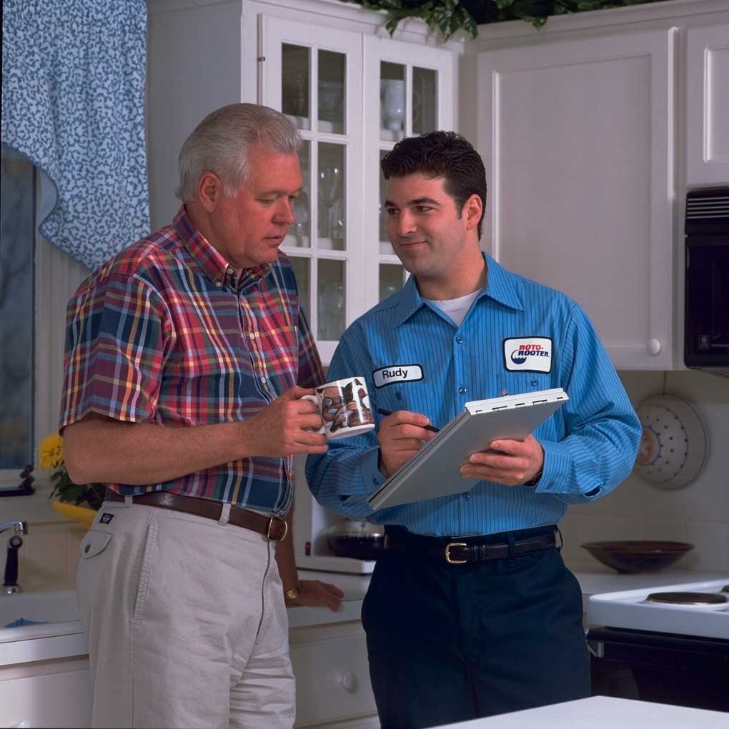 Two men chatting — Kalamazoo, MI — Roto-Rooter of Southwest Michigan
