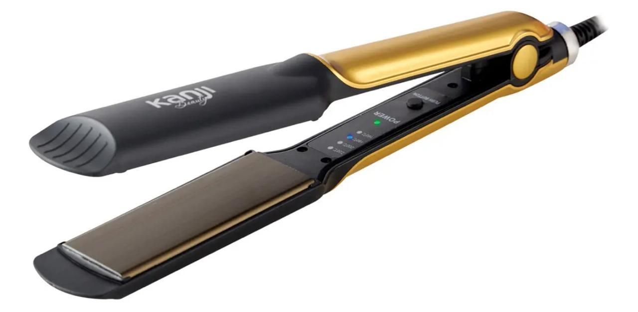 Plancha alisadora de pelo dorada y negra sobre fondo blanco