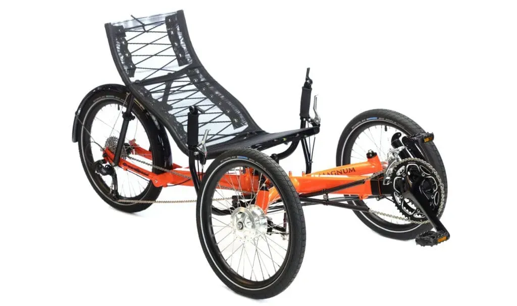 Orange and black recumbent tricycle with a mesh seat.