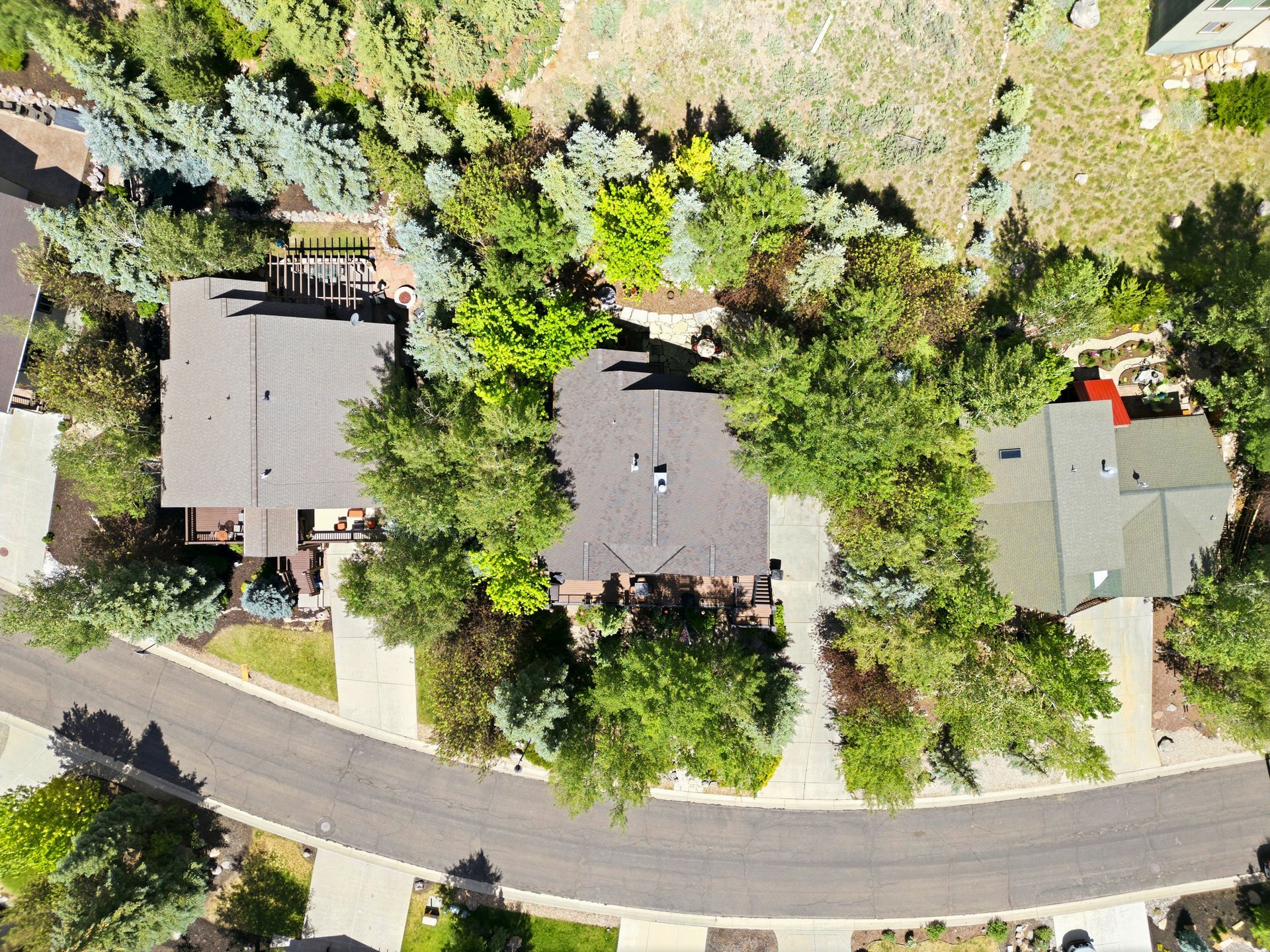 Aerial drone view of the luxury property at 12384 N Ross Creek Drive nestled in the desirable Deer Mountain community.