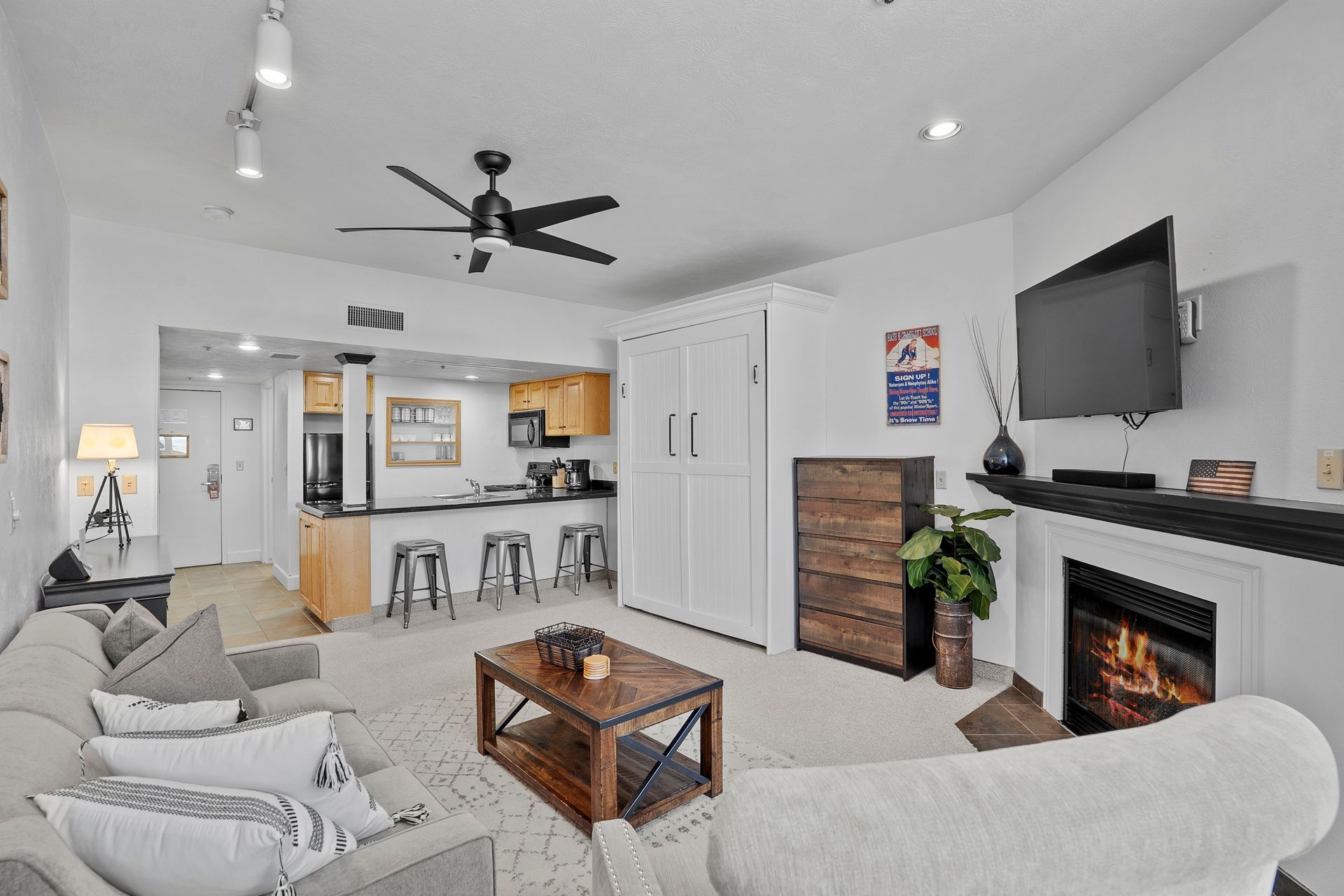 Main living area of the ski-in/ski-out studio at Park City Mountain Resort featuring a gas fireplace.