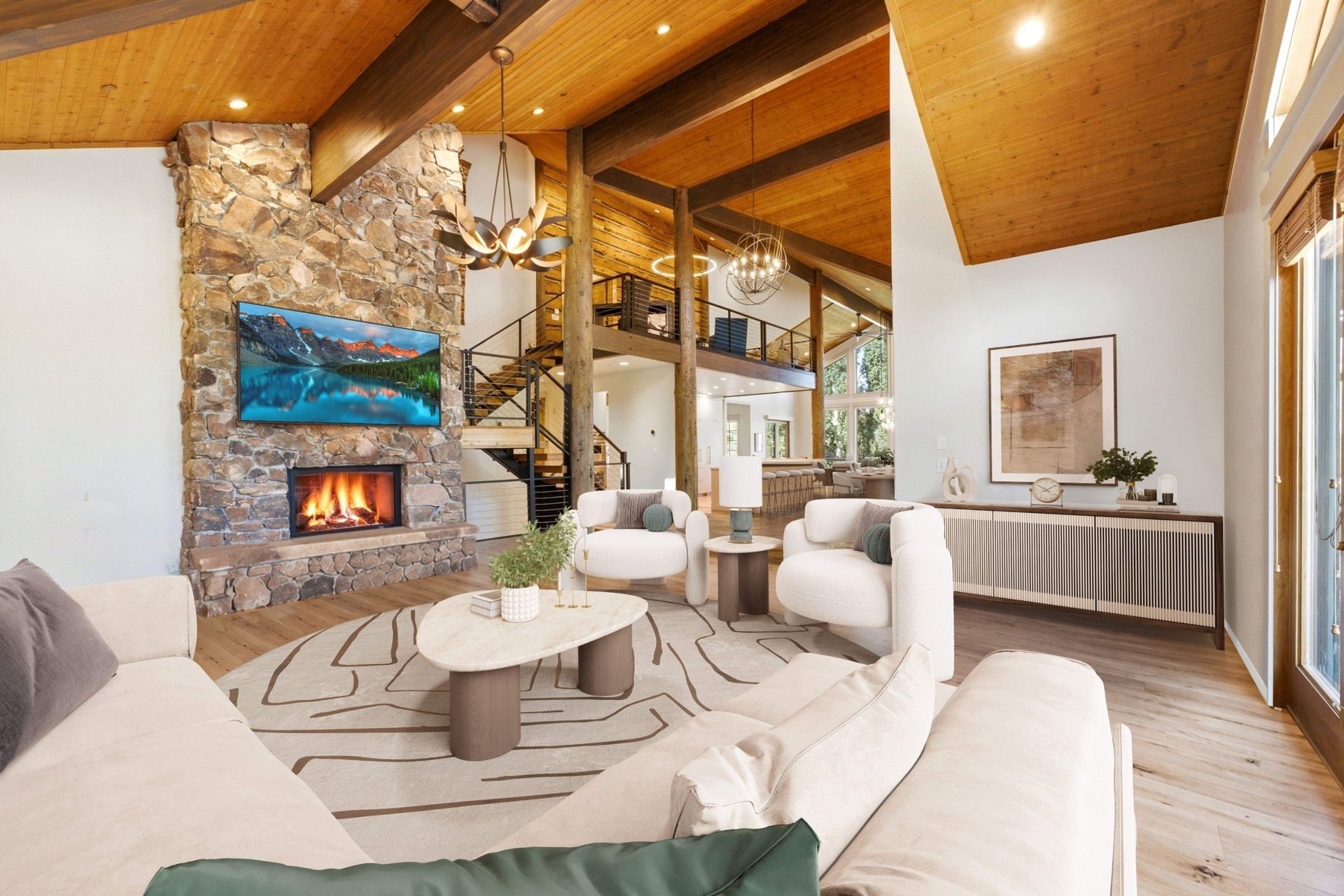 Virtually staged great room at 2490 Silver Cloud Dr with stone fireplace, boucle armchairs, and open staircase to the 