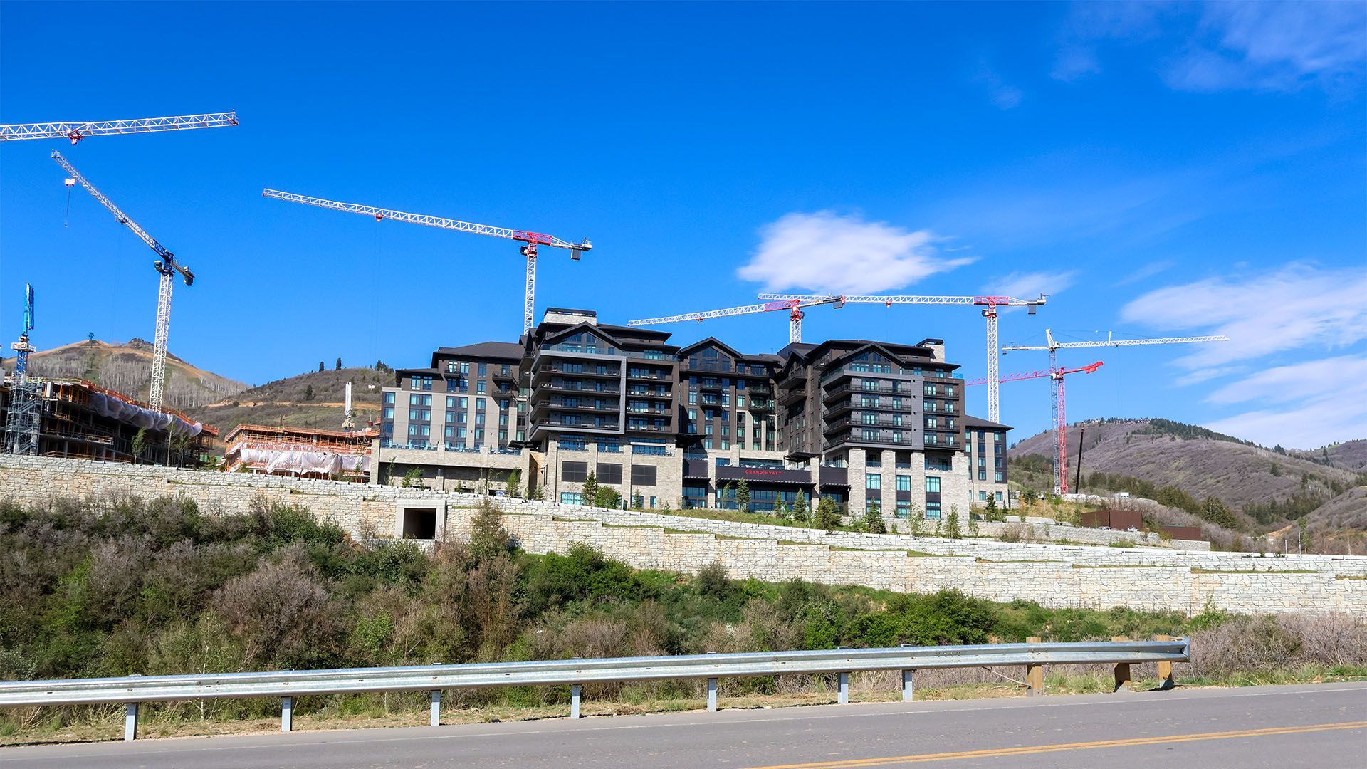 Construction cranes and building frames at Deer Valley East Village on US-40 near the Jordanelle, where 250,000 square feet of retail is under construction