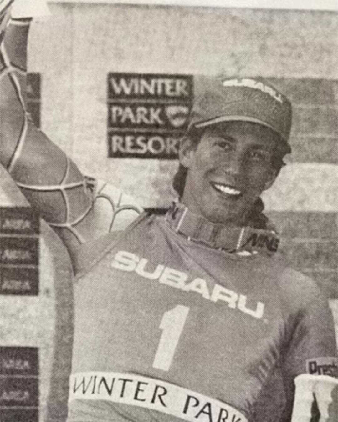 Kevin Schlopy standing on a skiing podium | Schlopy Real Estate Team