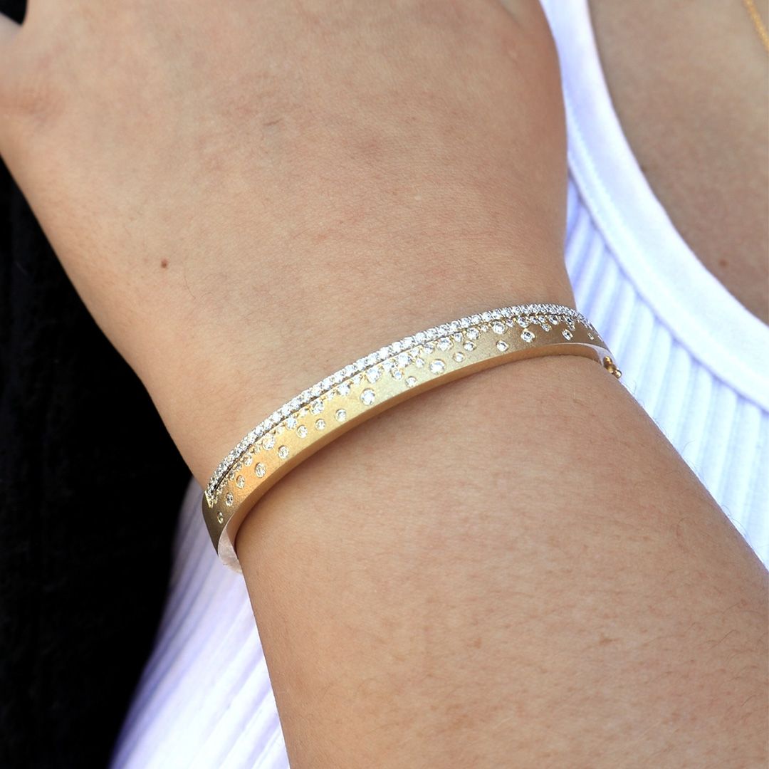 A close-up of a sparkling diamond confetti bracelet from Park City Jewelers.