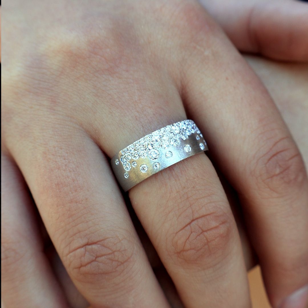 A detailed view of a custom diamond confetti ring crafted by Park City Jewelers on Main Street.