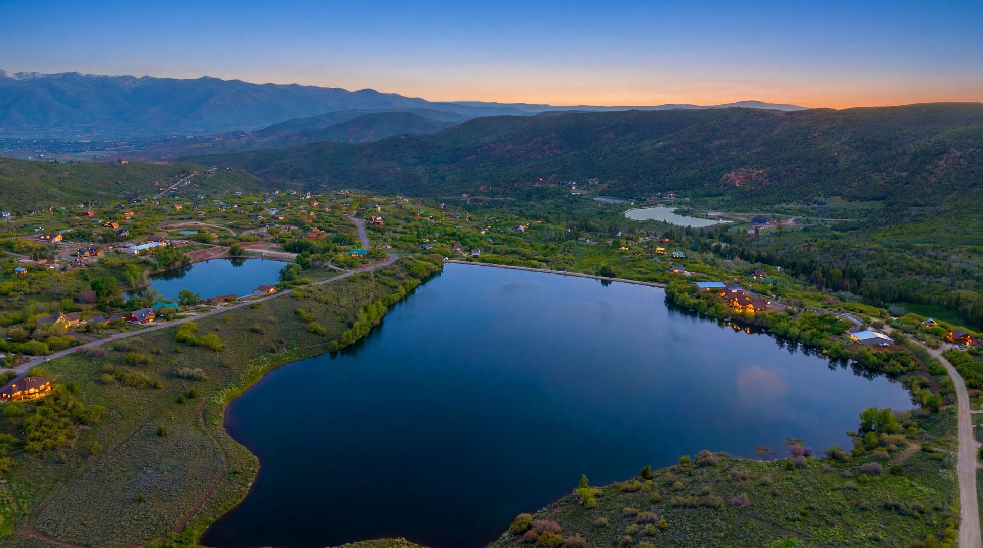 Beautiful twilight view of the serene alpine lakes within the Timber Lakes gated mountain community.