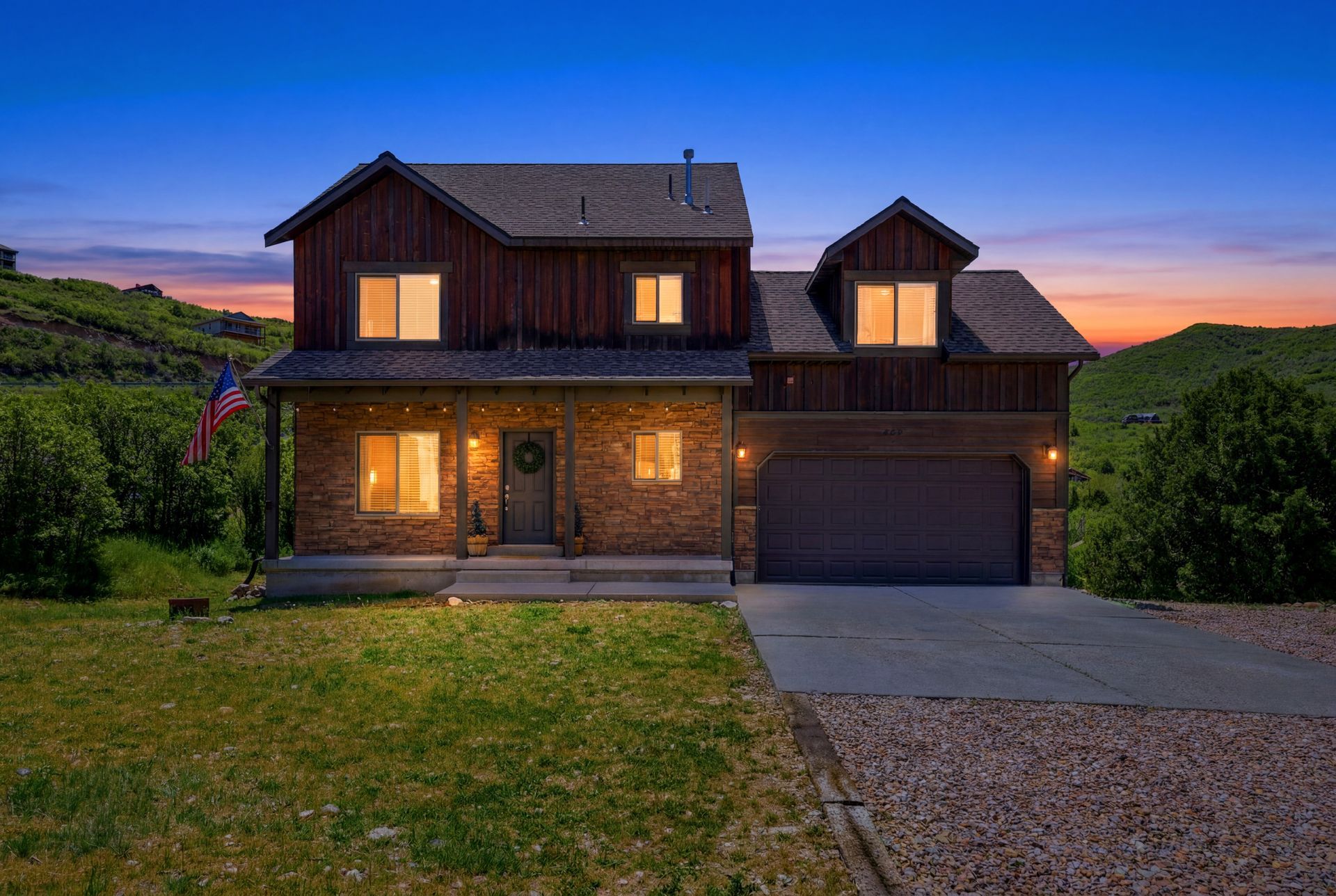 Exterior front view of the beautiful 4-bedroom mountain home at 8374 E Lake Pines Drive in Heber City, Utah.
