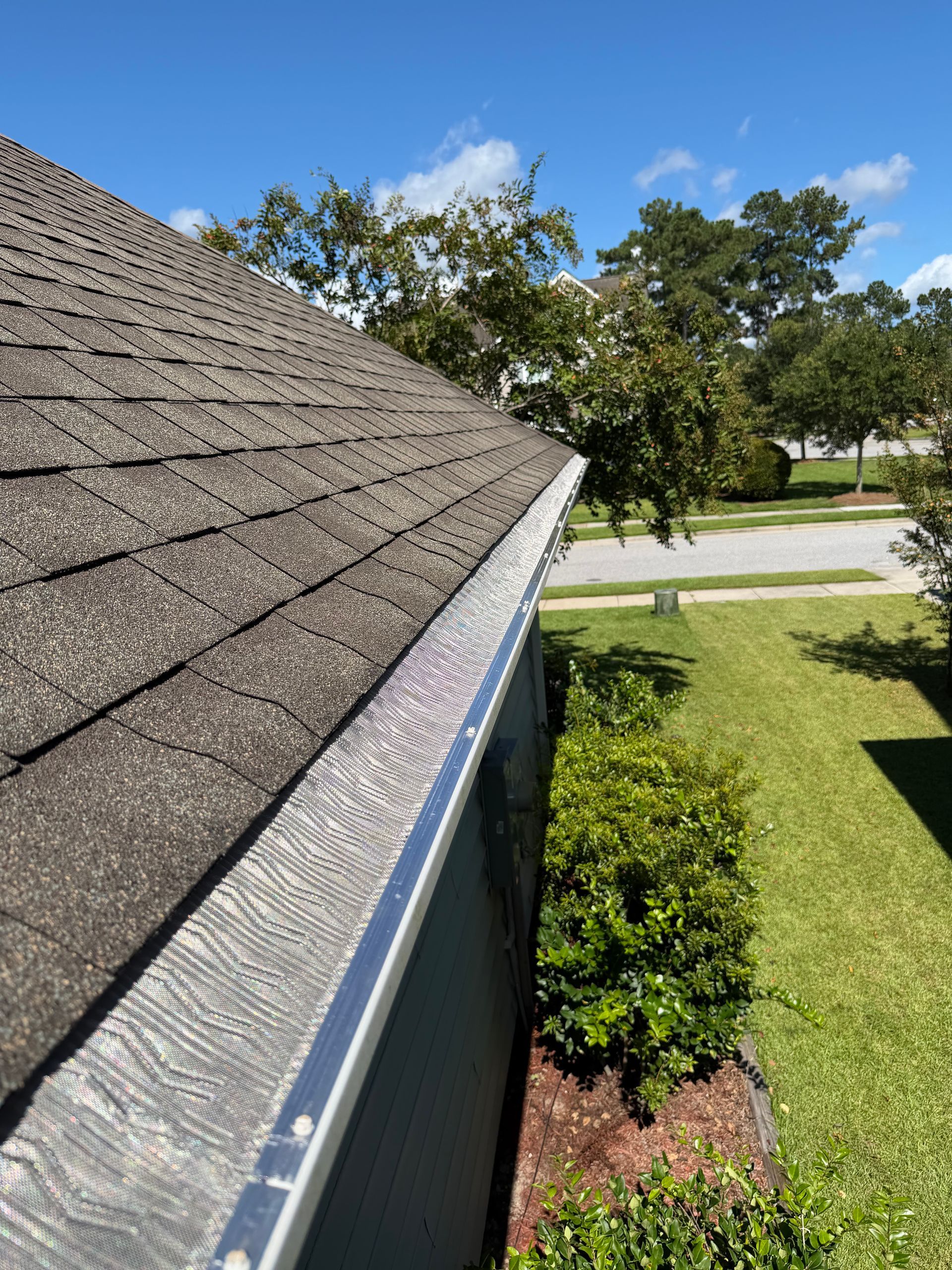 A grid of finished Charleston Roofs and Windows projects on Seabrook Island, SC: an Atlas shingle replacement on a golf course home, a standing seam metal roof on an oceanfront house behind the dunes, a modified bitumen porch roof on a marsh home, Viwinco windows on a villa building, fiber cement siding and seamless gutters. The image shows every roofing and exterior service Seabrook Island homeowners can book.