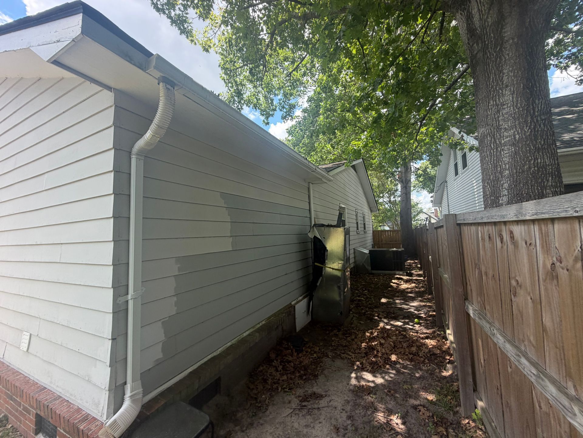 Seamless aluminum vs copper half-round gutters near you installed by Charleston Roofs and Windows