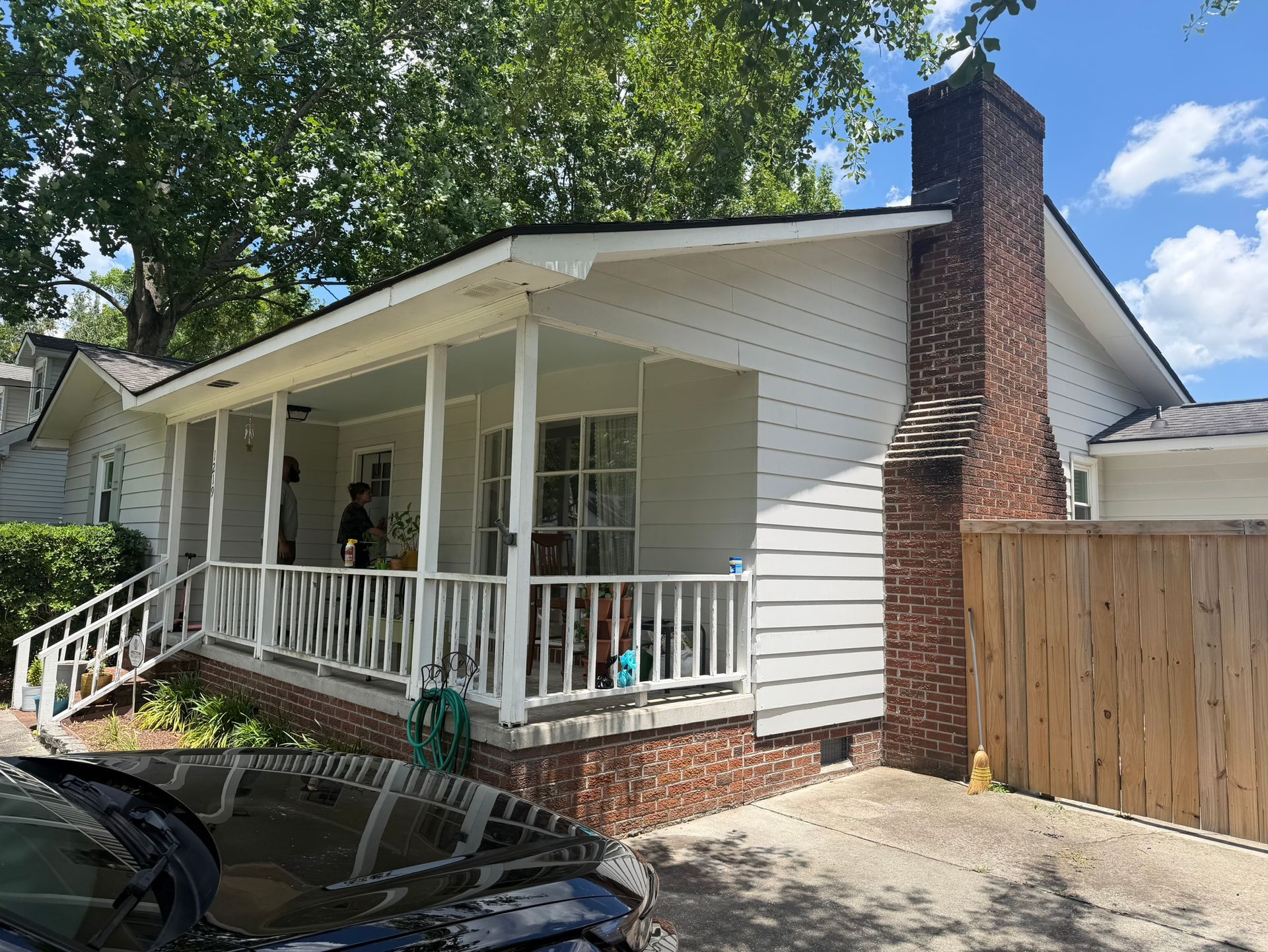 Hardie siding installation near you Charleston Roofs and Windows office and service trucks
