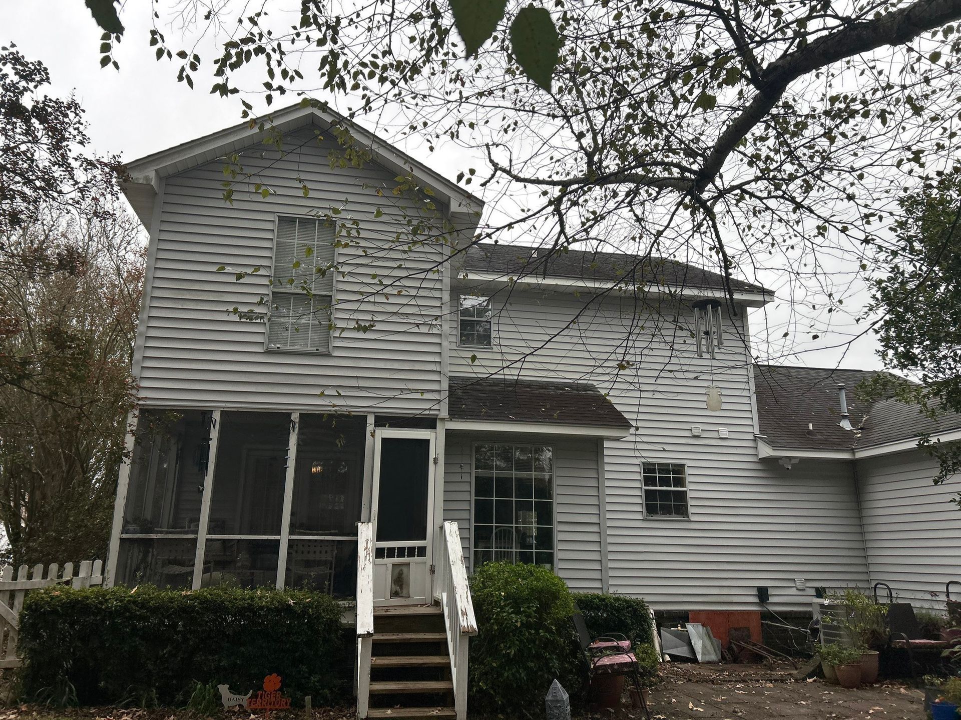 Gutter installation near you Charleston Roofs and Windows office and service trucks