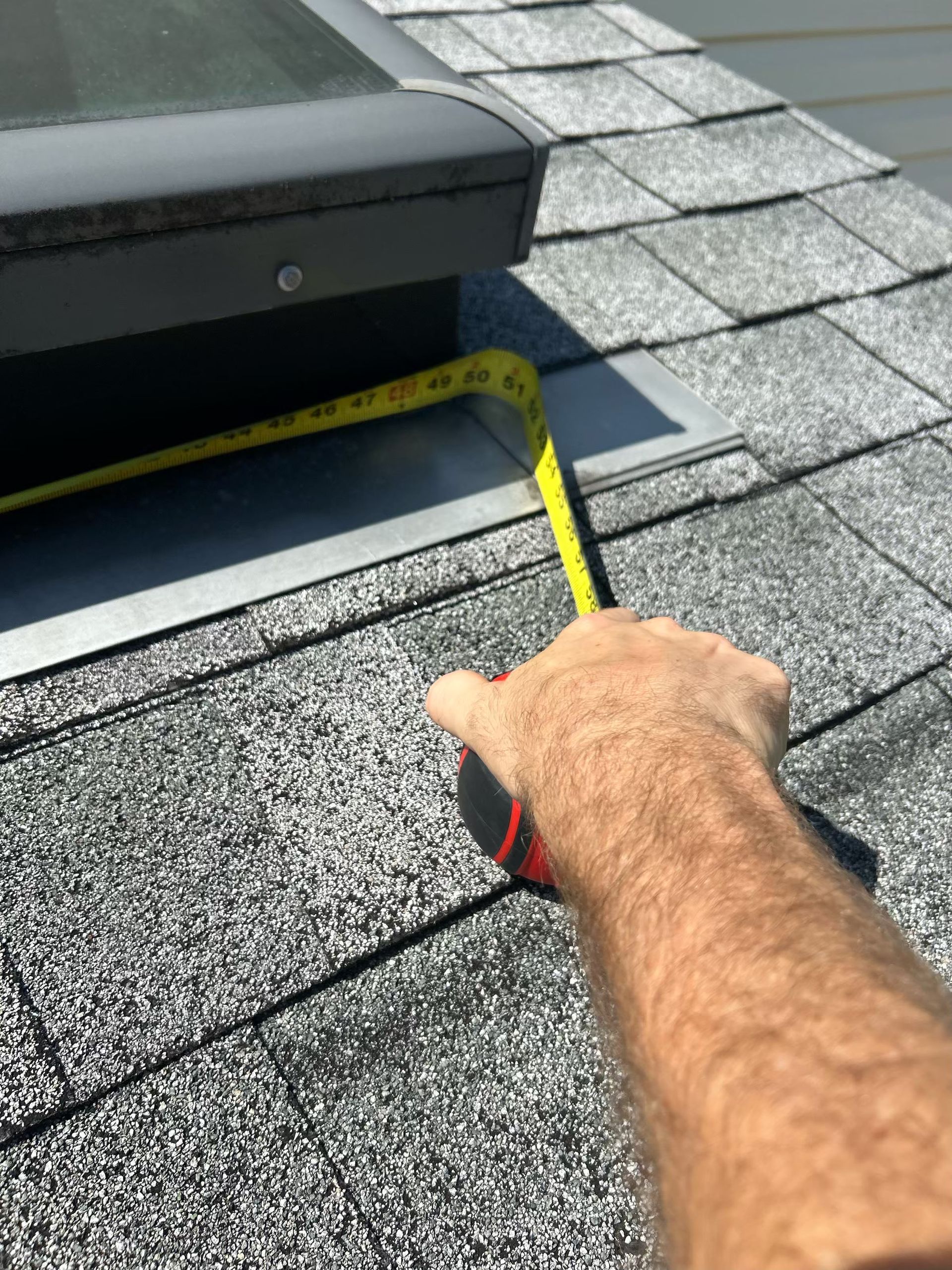 Roof inspection company near you inspection manager explaining roof photos to a homeowner