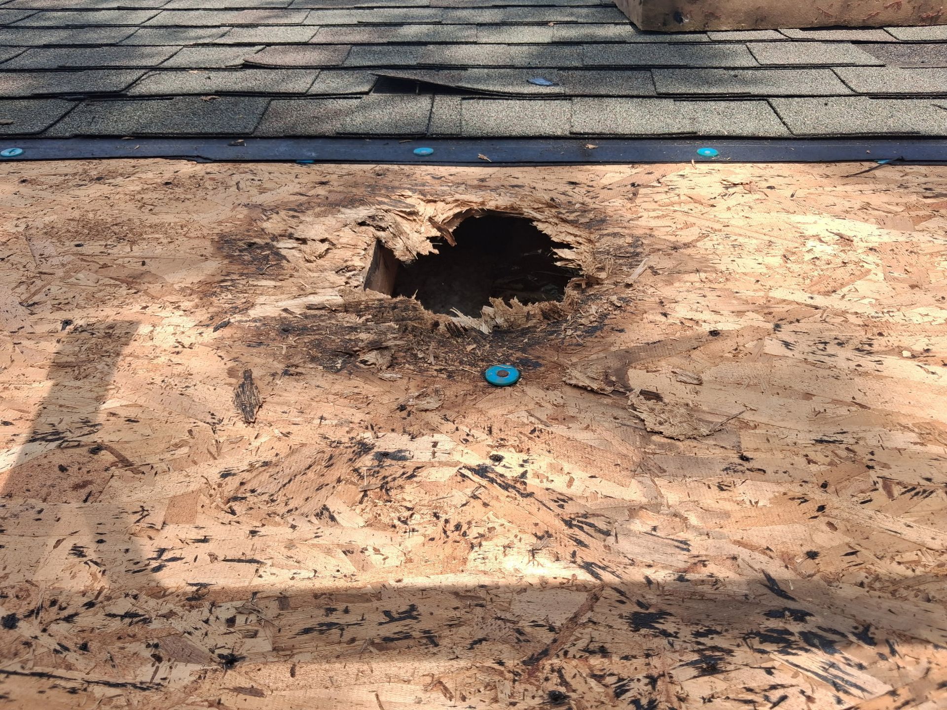 Roof replacement near you with a full tear-off and new Atlas shingle roofing system installed in one day