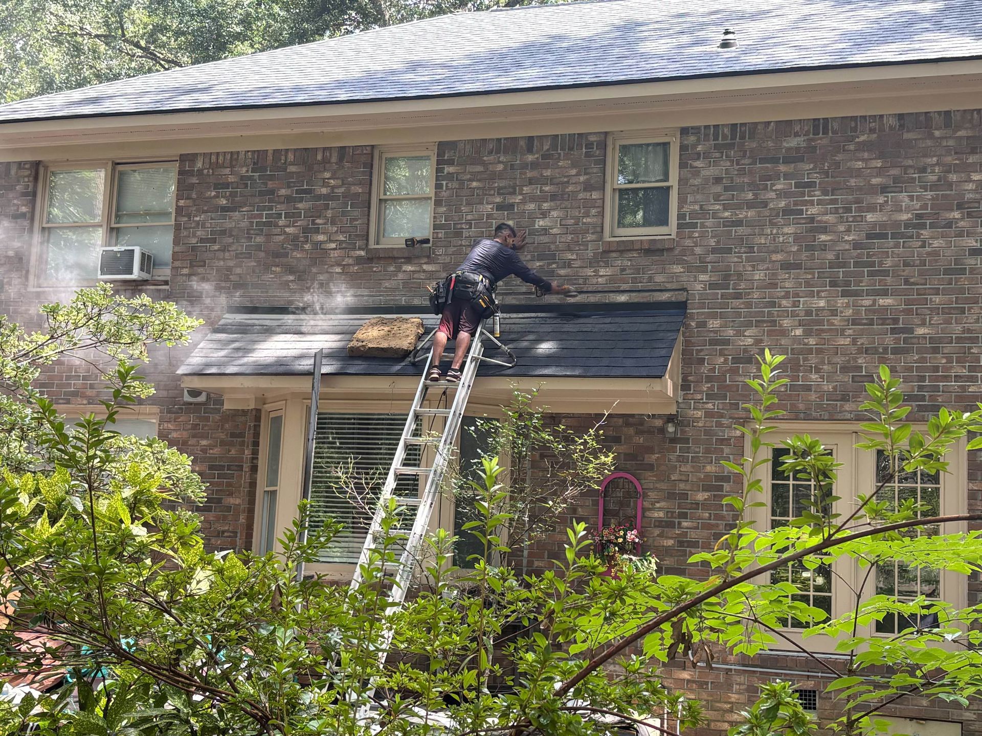 Signs you need a roof replacement near you including granule loss and curled shingles