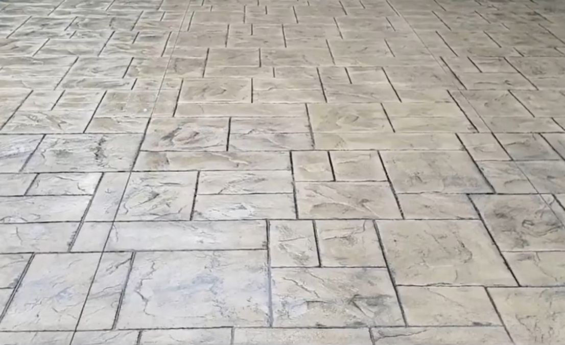 Close-up image of a stamped and stained concrete patio