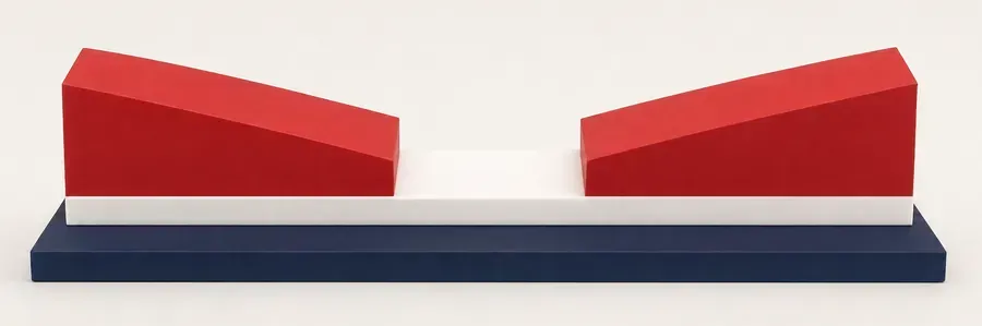The Hip Balancer from the side: two red foam wedges on a white strip, tall at the outer ends and sloping down toward the middle, on a navy foam board