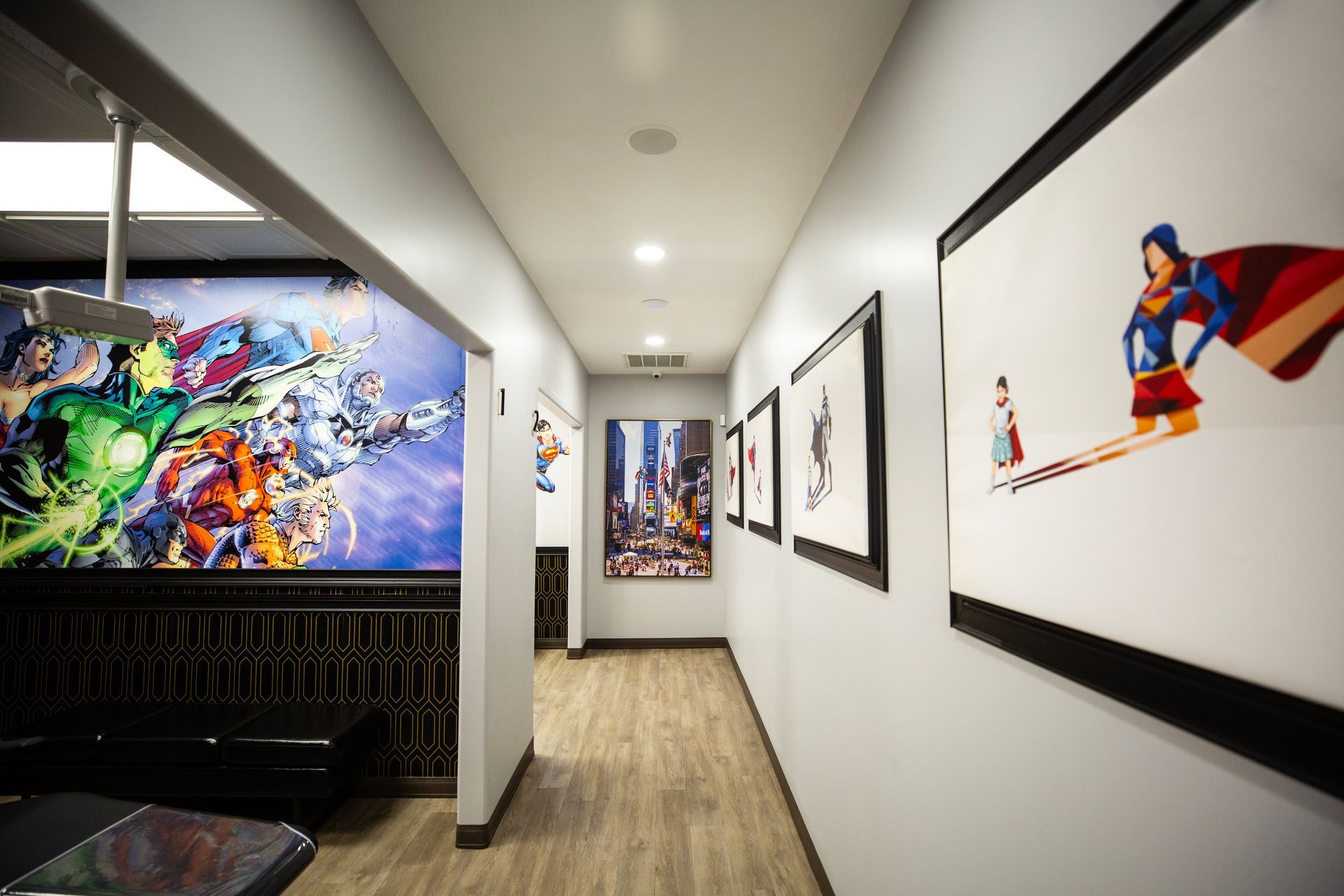 Super Dentists in San Antonio A hallway with a lot of paintings on the wall.